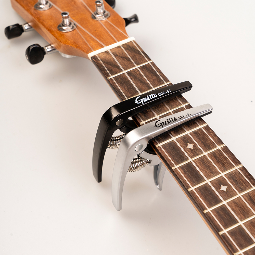 GUITTO GGC-07 Ukulele Capo Qui - Musical Instrument Note recensie en prijs